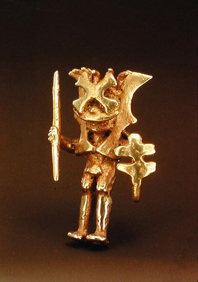Pendant of a masked figure from the Cauca Valley, Colombia by Pre Columbian Pre Columbian